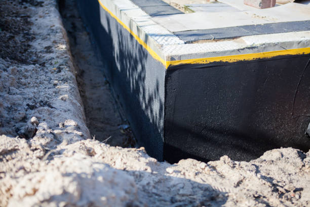 Professional Waterproofing technician working in Westminster, SC